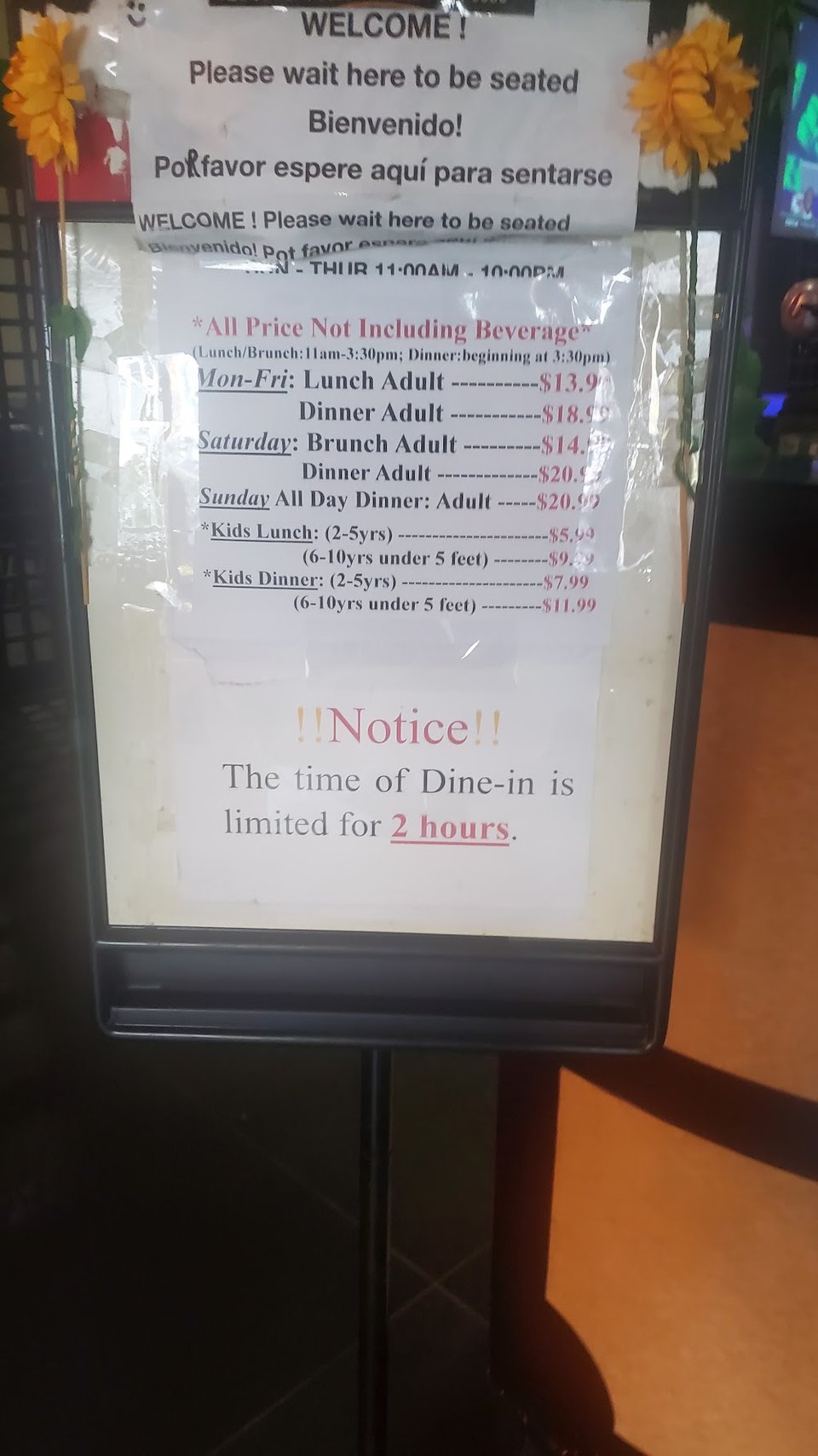 Menu board with bottle beer and wine choices.